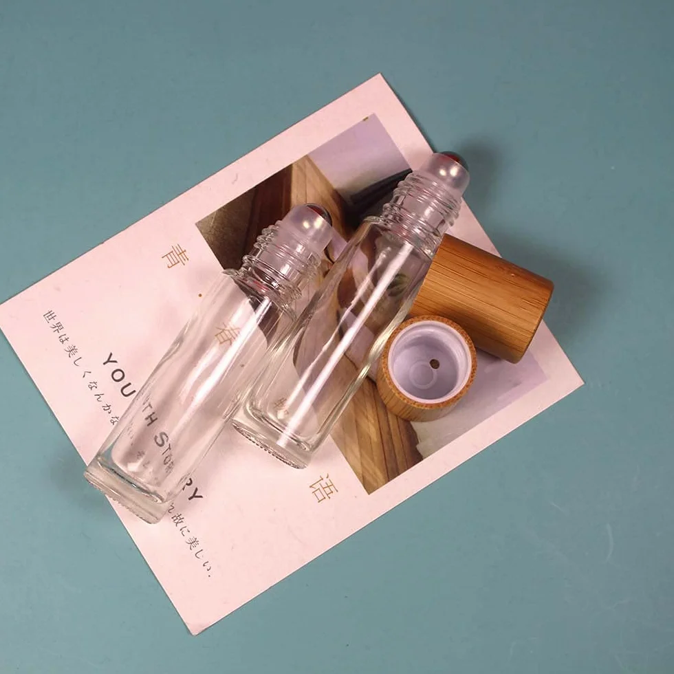 COSIDEA 18 bottiglie a rullo in bambù da 10 ml con tappo in bambù per oli essenziali, vuote, in vetro, per profumo, trasparenti