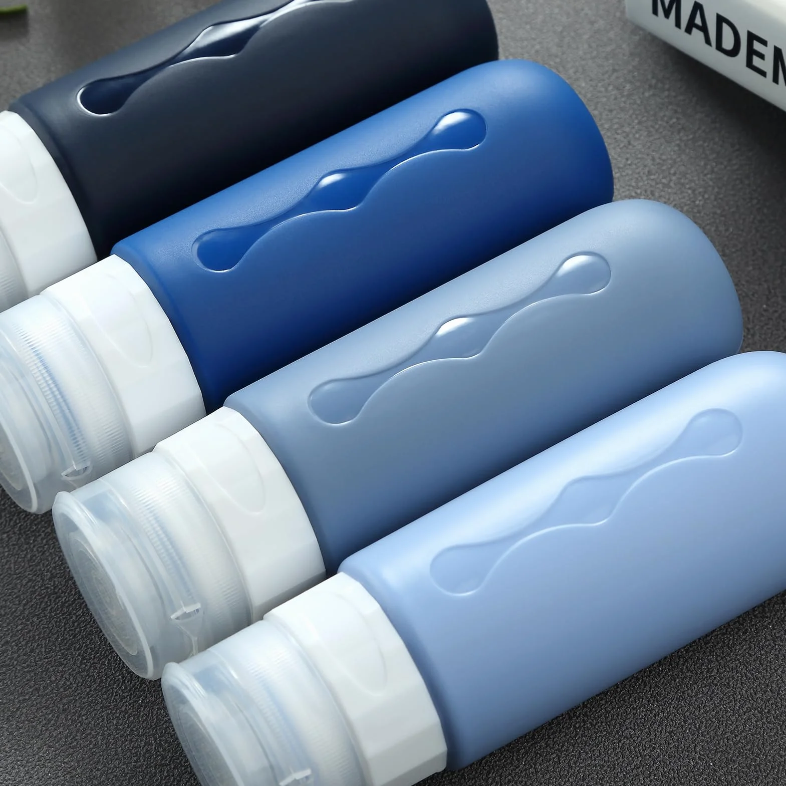 Gemice Bottiglie da Viaggio in Silicone, 4Pezzi 90ml Contenitori con Riutilizzabili Comprimibili, per Shampoo, Balsamo, Crema, Lozione, per Viaggio in Aereo