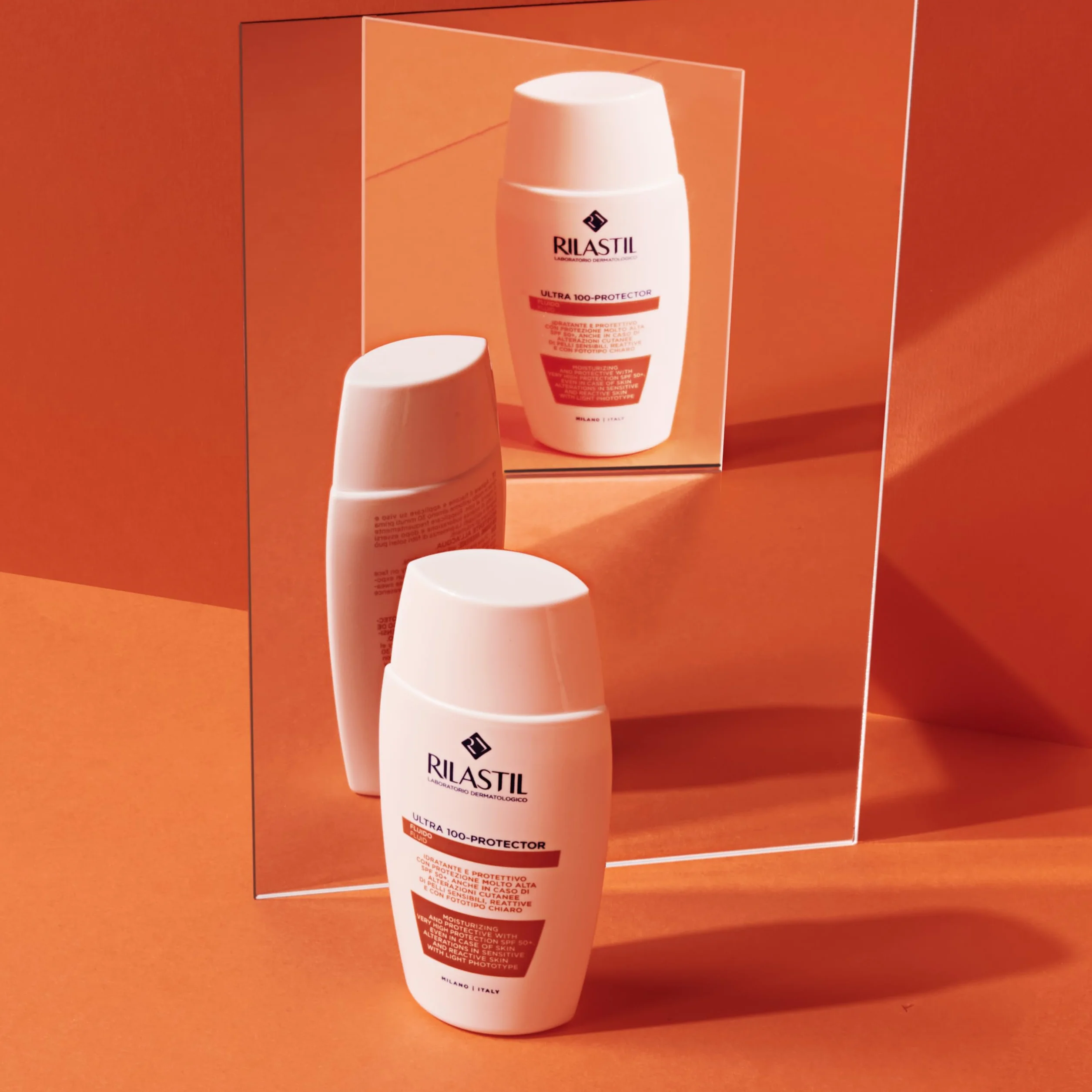 Rilastil Fluido 100, Emulsione Fluida Idratante e Protettiva, Texture Ultraleggera, Resistente all'Acqua, per Pelle Sensibile, Confezione da 50ml